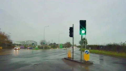 Driving along a flooded road in Lancashire. The wiper blades struggle to Stock Footage 142407053