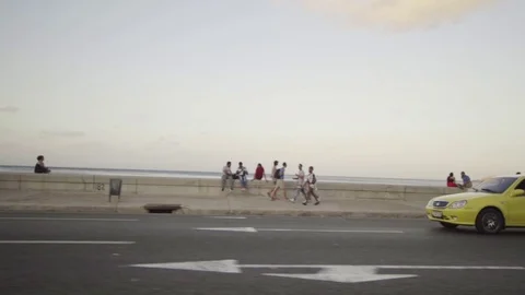 DRIVING ALONG THE MALECON  Stock Footage 72782592