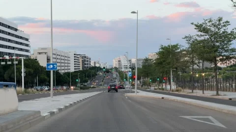 Driving along modern boulevard at dusk in Madrid 库存影片 338195061