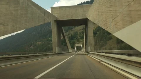 Driving Along Mountain Highway Bridge Through Alpine Valley Stock Footage 342752004