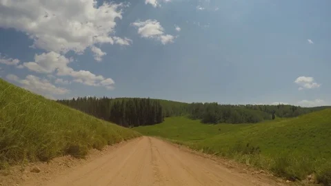 Driving along a Mountain road Stock Footage 84140890