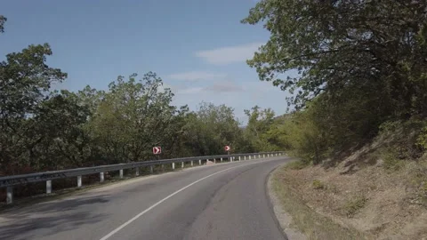 Driving along a mountain road. 스톡 동영상 141837103
