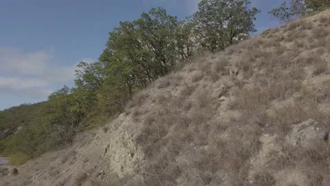 Driving along a mountain road. 動画素材 141837149