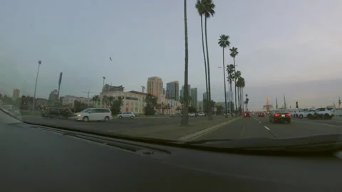 Driving Along Pacific Highway Toward Downtown Skyline 動画素材 344612660