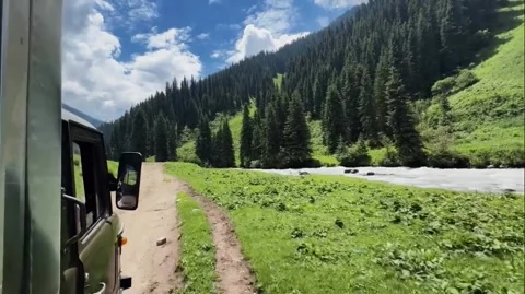 Driving Along River in Green Mountain Valley Stock-Footage 340869778