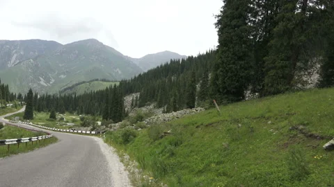 Driving along the road from the high beautiful mountains 3 Stock Footage