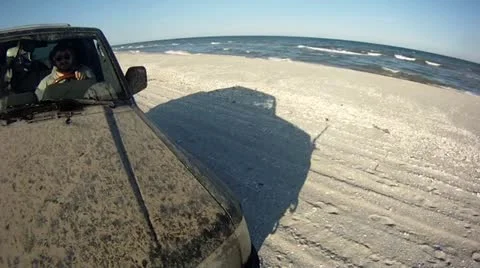 Driving along snowy beach Stock Footage 14808227