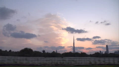 Driving along with the sunset in the background Stock Footage 241352380