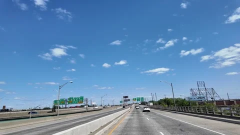 Driving Along US-22 in Newark, NJ Under a Clear Blue Sky Stock Footage 282331028