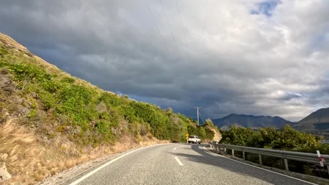 Driving Along Winding Mountain Road Near Lake Wakatipu Vídeos de archivo 319972718