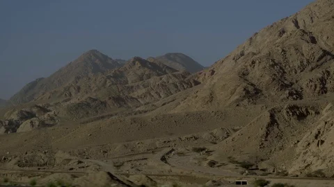 Driving Alongside Desert Mountain and power line Stock Footage 102503547