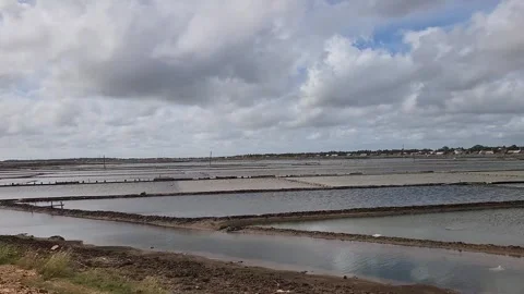 Driving Alongside A Salt Farm Stock Footage 248802856