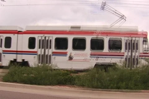 Driving alongside tram Stock Footage 522549
