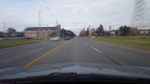 Driving up to and Ending at Left Turn Lane Intersection With Motion Blur Video stock 98322093