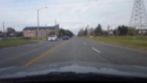 Driving up to and Ending at Left Turn Lane Intersection With Blur Effect Video stock 98322218