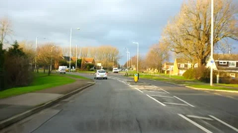 Driving around a roundabout Stock Footage 10722666