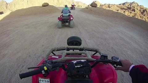 Driving ATVs in the Desert of Egypt Stock Footage 272267240