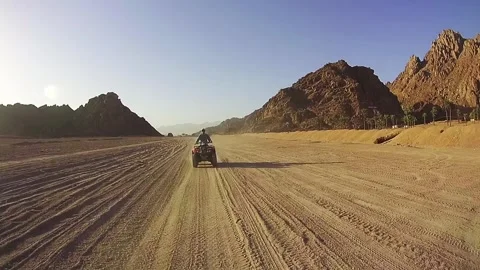 Driving ATVs in the Desert of Egypt Stock Footage 272267357