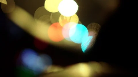 Driving back home with street and car lights soft bokeh, in a moving Stock Footage