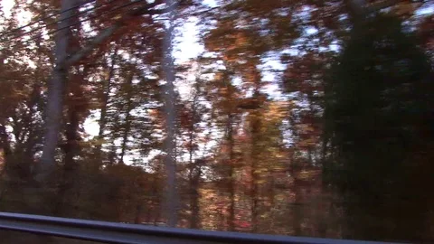 Driving on backroad through town Stock Footage 79230441