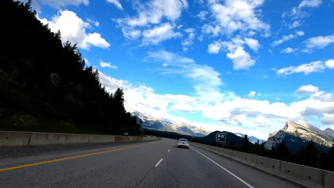 Driving into Banff go pro mounted Stock Footage 244816715