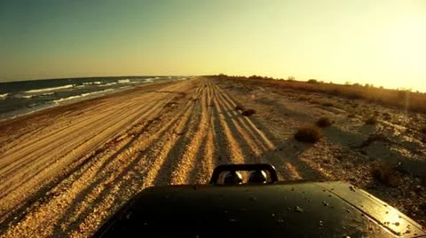 Driving on the beach Video stock 14808334