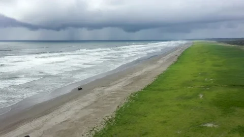 Driving on the beach Stock Footage 132615448