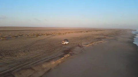 Driving on the Beach Stock Footage 276577549