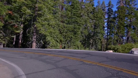 Driving the bend with Half Dome Yosemite Stock Footage 93316208