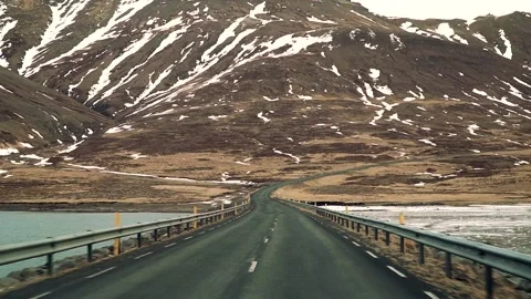 Driving between the lakes in the mountains Stock Footage 145078260