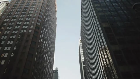 Driving between two large buildings Stockbeeldmateriaal 146186619