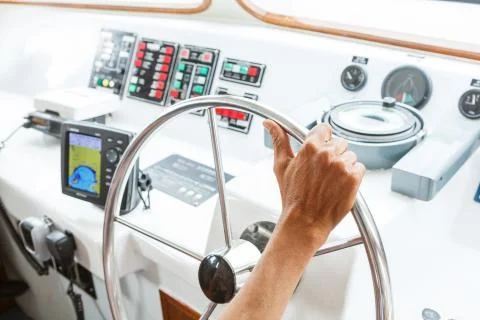 Driving boat Stock Photos