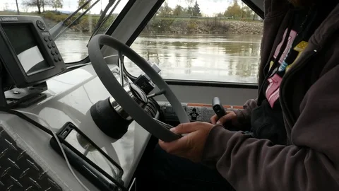 Driving a boat on river. Inside view. Stock-Footage 74713384