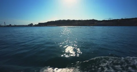 Driving with a Boat through Harbour of Valetta Malta 4k Video Stock Footage 79976591