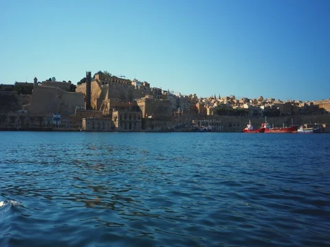 Driving with a Boat through Harbour of Valetta Malta 4k Video Stock Footage 79976623