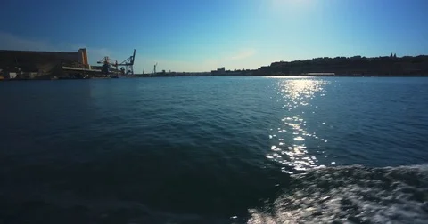 Driving with a Boat through Harbour of Valetta Malta 4k Video Stock Footage 79977066