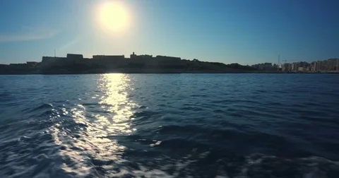 Driving with a Boat through Harbour of Valetta Malta 4k Video Stock Footage 79979809