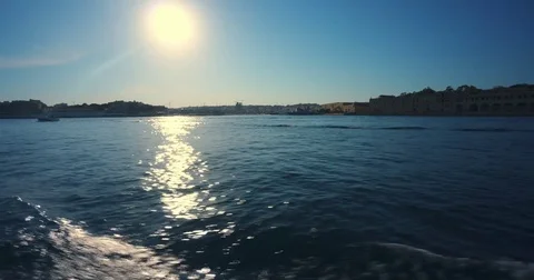 Driving with a Boat through Harbour of Valetta Malta 4k Video Stock Footage 79980048