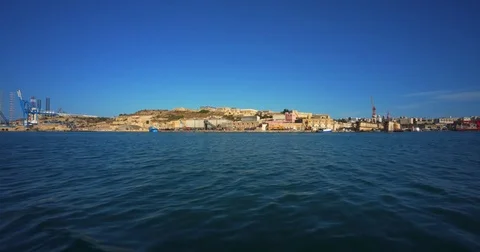 Driving with a Boat through Harbour of Valetta Malta 4k Video Stock Footage 79986872
