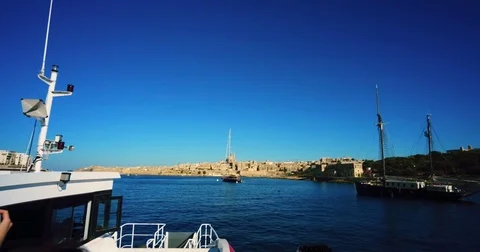 Driving with a Boat through Harbour of Valetta Malta 4k Video Stock Footage 80342814