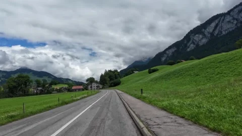 Driving Bridge with Panoramic Alpine Valley View Stock Footage 340046159