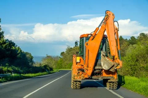 Driving bulldozer digger scraper  - construction sites vehicles Stock Photos
