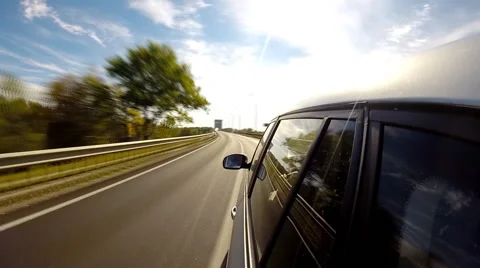 Driving a car across the bridge. The camera is left outside. Timelapse Stock Footage 42517477