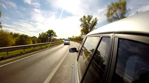Driving a car across the bridge. The camera is left outside Stock Footage 42528092
