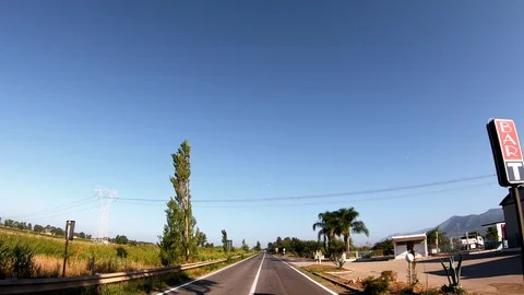 Driving a Car along empty Road in Italy on a sunny day with clear sky. 스톡 동영상 101560271