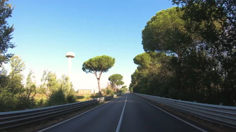 Driving a Car along empty Road in Italy on a sunny day with clear sky. Stock Footage 224455047