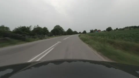 Driving car on bad bumpy asphalt 4K video Video stock 158776347