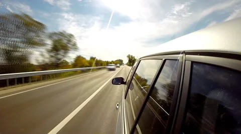 Driving a car. The camera is left outside. Timlapse Stock Footage 42622393