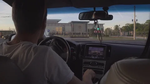 Driving a car in the city Stock Footage 76630745