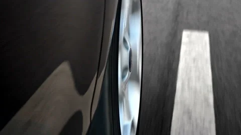 Driving A Car close up to wheel Vidéo 210653488